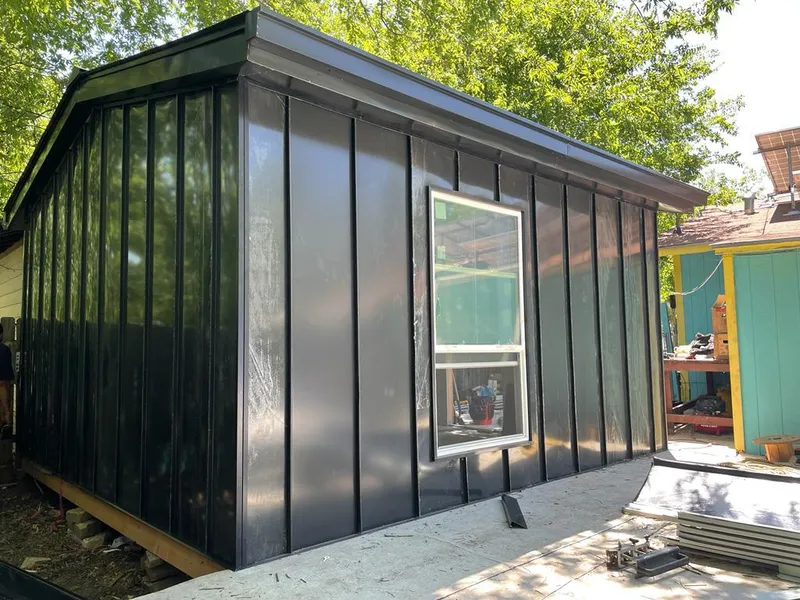 Black standing seam metal wall panels for Metal Roof Installation in Cedar Rapids